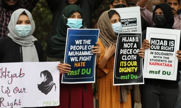 Outrage after hijab-wearing woman heckled by Hindu mob in India